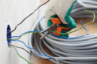 Electrician rewiring domestic property
