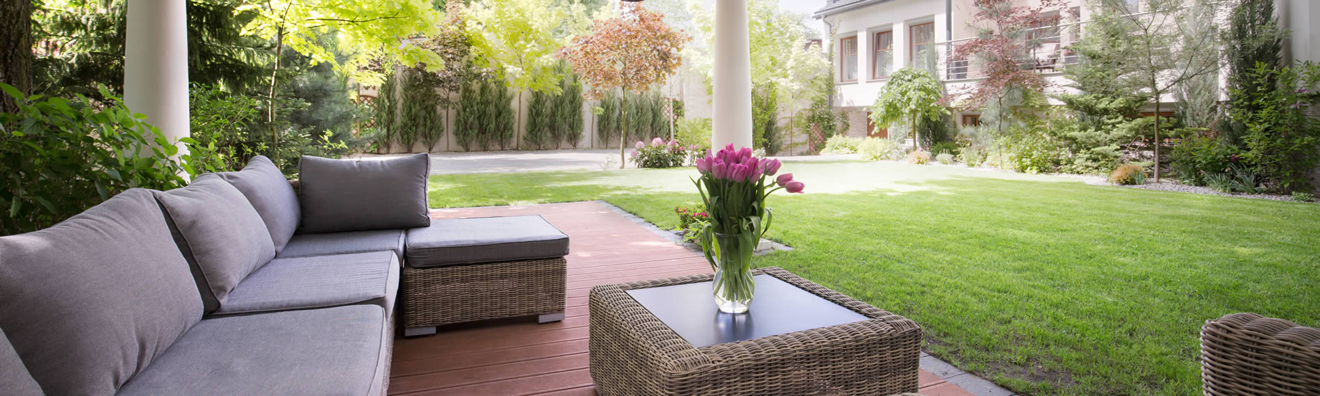 Elegant decking, turfing and pergoda in a large garden